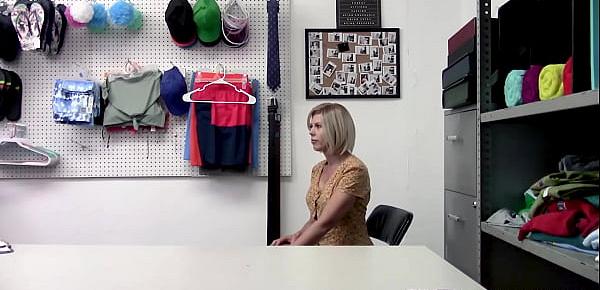  Blonde busty MILF Amber Chase was caught stealing clothes by a horny mall officer and fuck her inside the office.